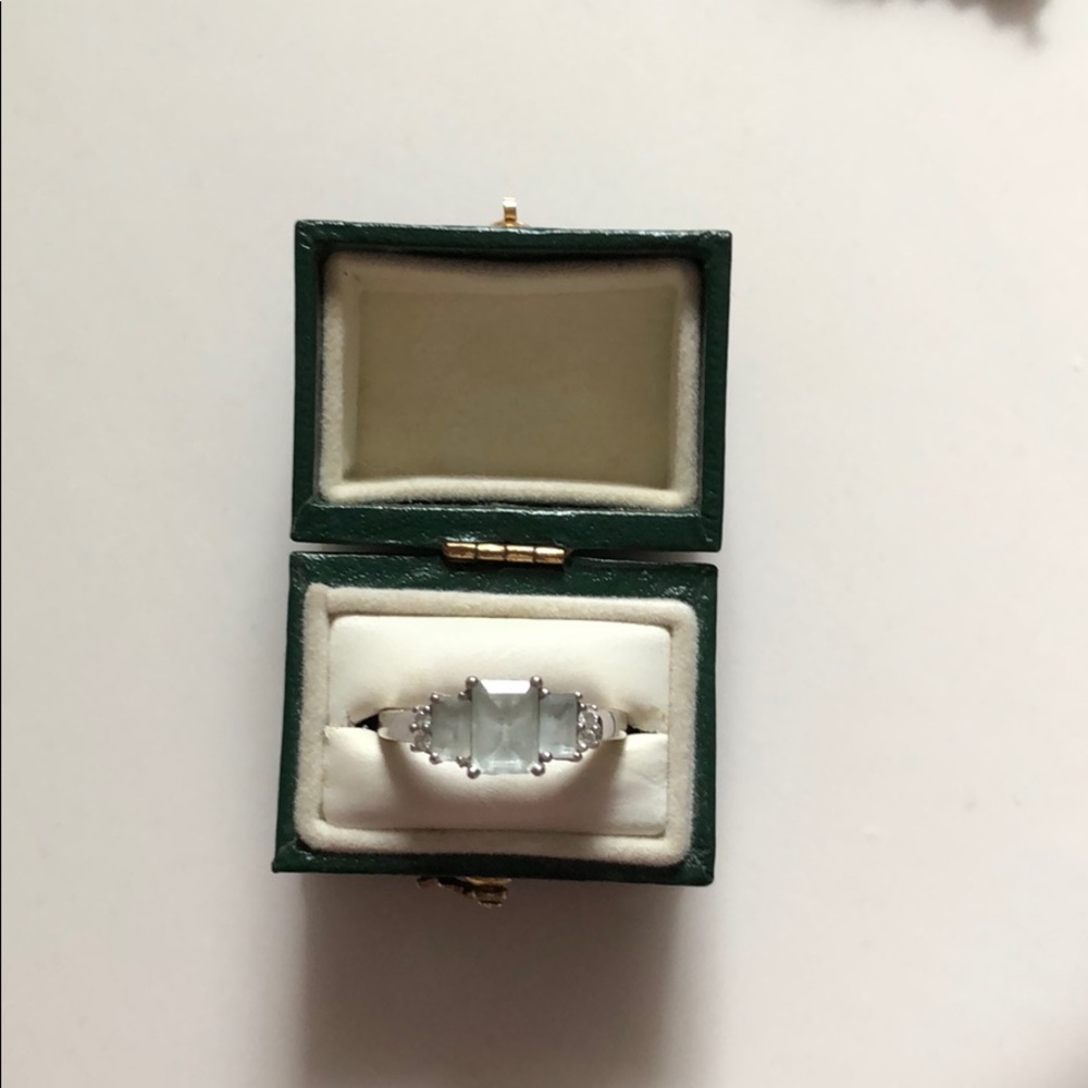 Emerald cut aquamarine and diamond white gold ring